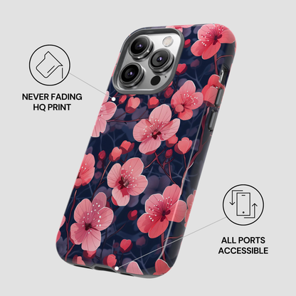 Phone case with pink floral design on a gray background