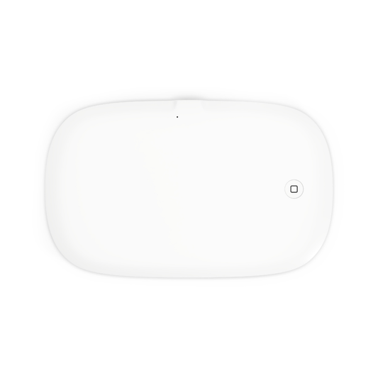 White rectangular device with a small camera lens on a white background