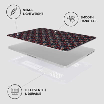 Laptop with a floral skin on a light gray background, featuring text labels about the product's features.