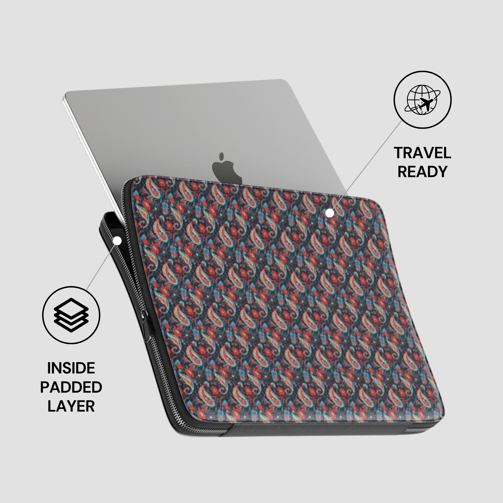 Patterned laptop sleeve with travel-ready features on a light gray background