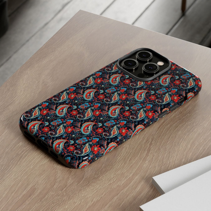 Phone case with a colorful paisley pattern on a wooden surface