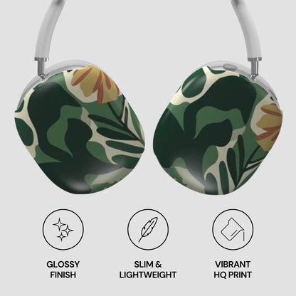 Pair of headphones with a green and brown leaf pattern on a light gray background