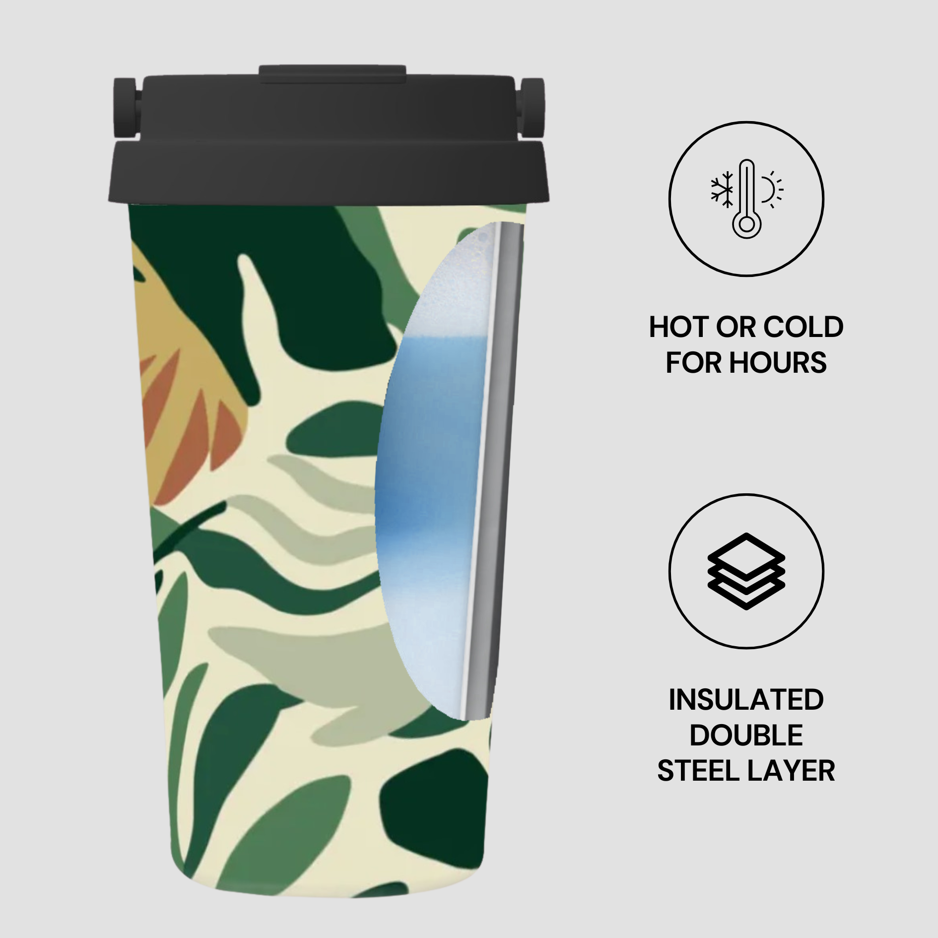Insulated tumbler with leaf pattern on a white background