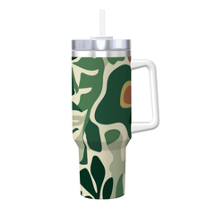 Tumbler with green leaf pattern on a white background