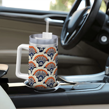 Patterned mug on a car dashboard with steering wheel in the background