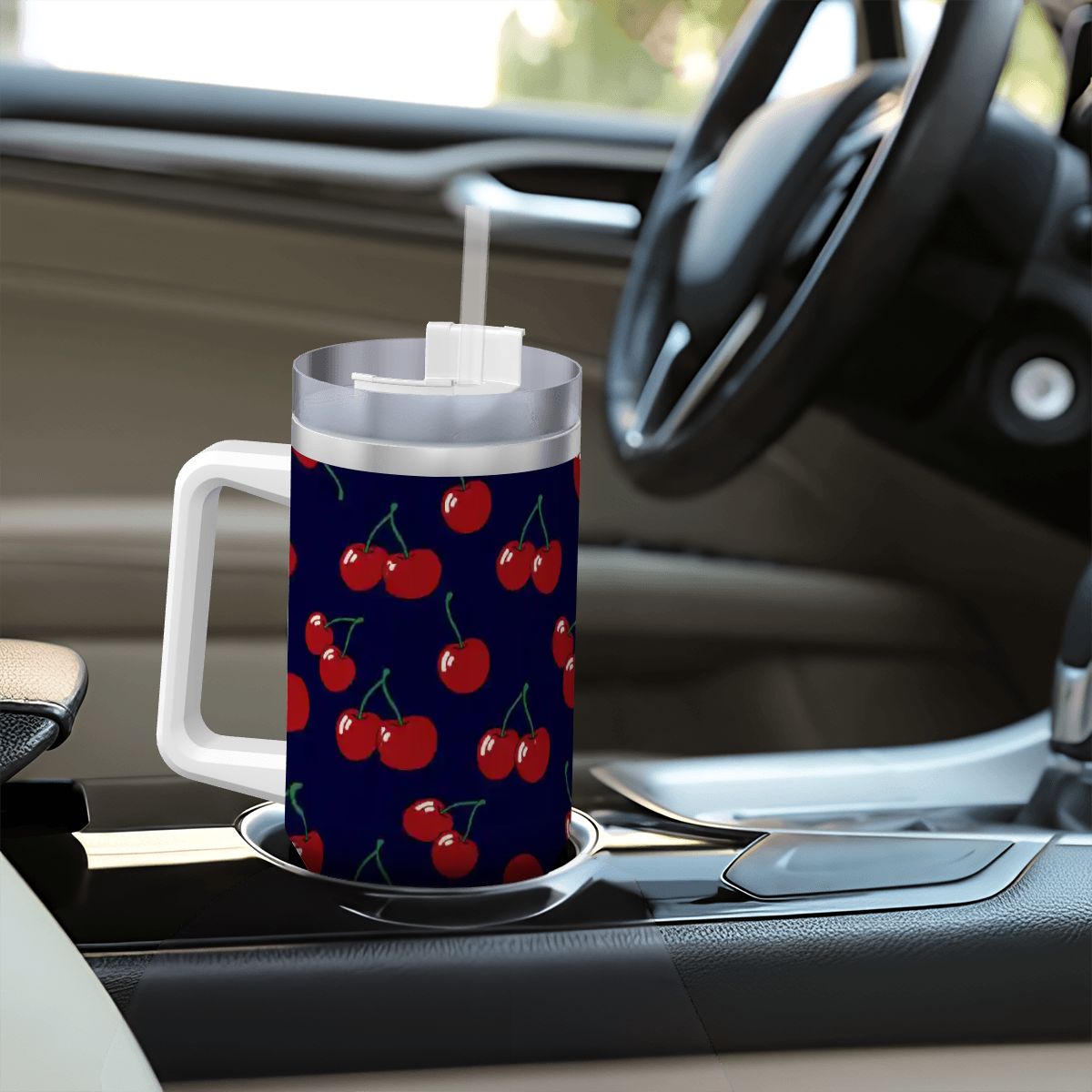 Tumbler with cherry pattern on a car dashboard