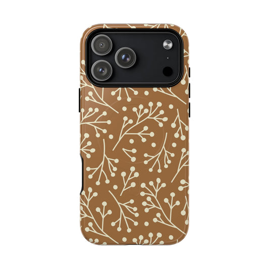 Phone case with a floral pattern on a brown background